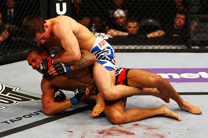 ATLANTA, GA - APRIL 21: Rory MacDonald (top) graples with Che Mills during their welterweight bout for UFC 145 at Philips Arena on April 21, 2012 in Atlanta, Georgia. (Photo by Al Bello/Zuffa LLC/Zuffa LLC via Getty Images)