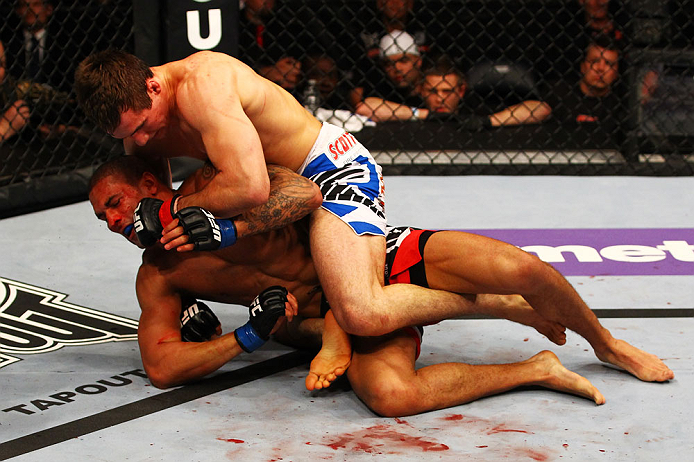 ATLANTA, GA - APRIL 21:  Rory MacDonald (top) graples with Che Mills during their welterweight bout for UFC 145 at Philips Arena on April 21, 2012 in Atlanta, Georgia.  (Photo by Al Bello/Zuffa LLC/Zuffa LLC via Getty Images)