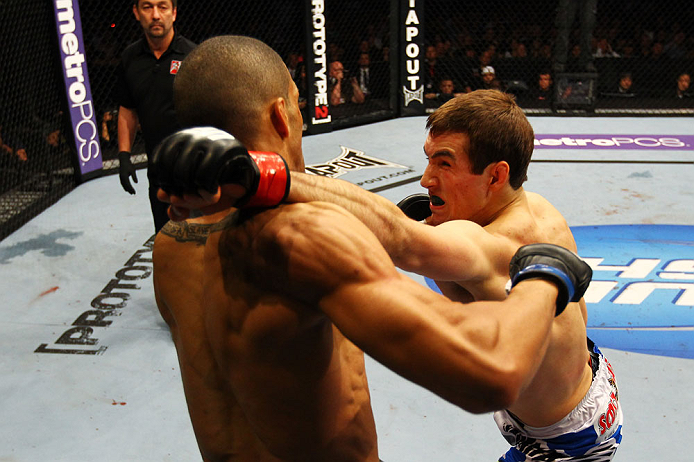 ATLANTA, GA - APRIL 21: Rory MacDonald (R) punches Che Mills during their welterweight bout for UFC 145 at Philips Arena on April 21, 2012 in Atlanta, Georgia. (Photo by Al Bello/Zuffa LLC/Zuffa LLC via Getty Images)