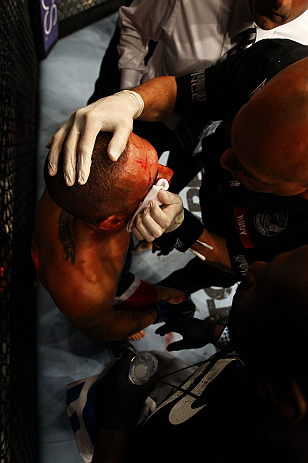 ATLANTA, GA - APRIL 21:  Che Mills recieves medical attention during his welterweight bout against Rory MacDonald for UFC 145 at Philips Arena on April 21, 2012 in Atlanta, Georgia.  (Photo by Al Bello/Zuffa LLC/Zuffa LLC via Getty Images)