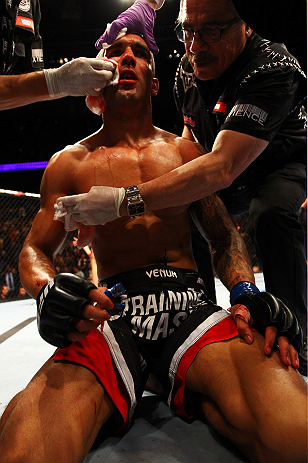 ATLANTA, GA - APRIL 21: Che Mills receives medical attention after deing defeated by Rory MacDonald by TKO during their welterweight bout for UFC 145 at Philips Arena on April 21, 2012 in Atlanta, Georgia. (Photo by Al Bello/Zuffa LLC/Zuffa LLC via Gett