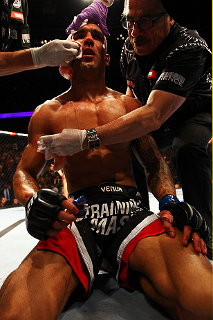 ATLANTA, GA - APRIL 21:  Che Mills receives medical attention after deing defeated by Rory MacDonald by TKO during their welterweight bout for UFC 145 at Philips Arena on April 21, 2012 in Atlanta, Georgia.  (Photo by Al Bello/Zuffa LLC/Zuffa LLC via Gett