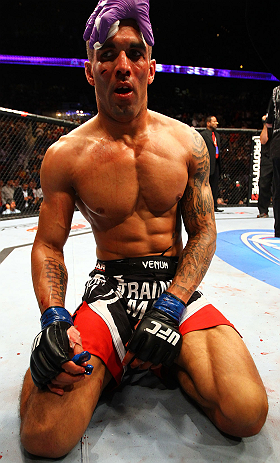 ATLANTA, GA - APRIL 21: Che Mills receives medical attention after deing defeated by Rory MacDonald by TKO during their welterweight bout for UFC 145 at Philips Arena on April 21, 2012 in Atlanta, Georgia. (Photo by Al Bello/Zuffa LLC/Zuffa LLC via Gett