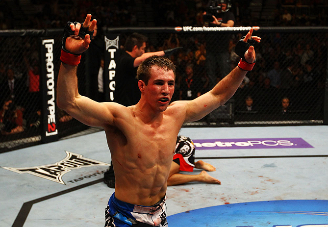 ATLANTA, GA - APRIL 21: Rory MacDonald celebrates as he defeats Che Mills by TKO during their welterweight bout for UFC 145 at Philips Arena on April 21, 2012 in Atlanta, Georgia. (Photo by Al Bello/Zuffa LLC/Zuffa LLC via Getty Images)