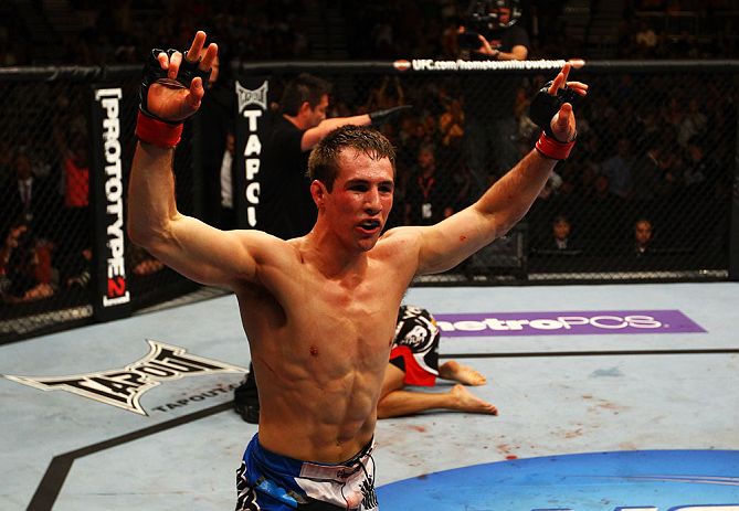 ATLANTA, GA - APRIL 21:  Rory MacDonald celebrates as he defeats Che Mills by TKO during their welterweight bout for UFC 145 at Philips Arena on April 21, 2012 in Atlanta, Georgia.  (Photo by Al Bello/Zuffa LLC/Zuffa LLC via Getty Images)