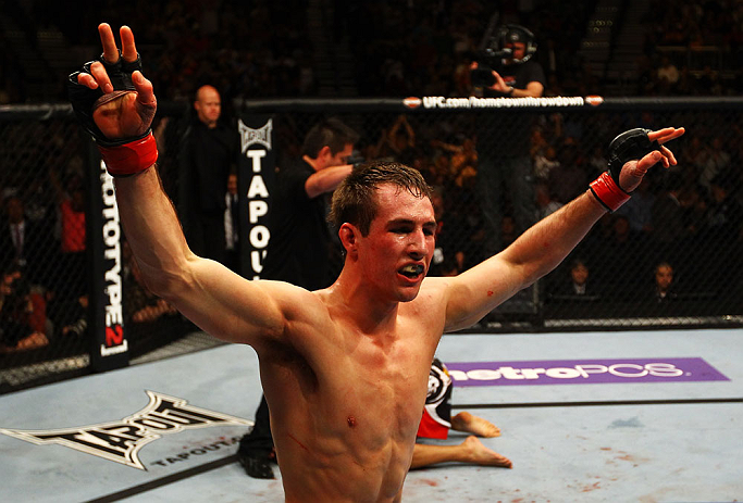 ATLANTA, GA - APRIL 21:  Rory MacDonald celebrates as he defeats Che Mills by TKO during their welterweight bout for UFC 145 at Philips Arena on April 21, 2012 in Atlanta, Georgia.  (Photo by Al Bello/Zuffa LLC/Zuffa LLC via Getty Images)