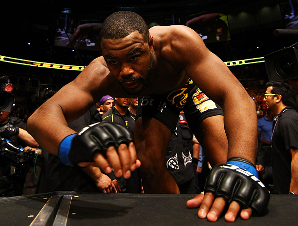 ATLANTA, GA - APRIL 21:  Rashad Evans climbs into the octagon for his light heavyweight title bout against Jon Jones for UFC 145 at Philips Arena on April 21, 2012 in Atlanta, Georgia.  (Photo by Al Bello/Zuffa LLC/Zuffa LLC via Getty Images)