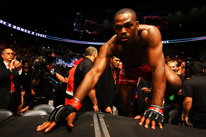 ATLANTA, GA - APRIL 21:  Jon Jones climbs into the octagon for his light heavyweight title bout with Rashad Evans for UFC 145 at Philips Arena on April 21, 2012 in Atlanta, Georgia.  (Photo by Al Bello/Zuffa LLC/Zuffa LLC via Getty Images)