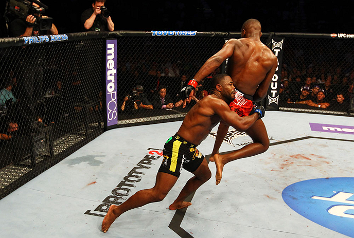 ATLANTA, GA - APRIL 21: Rashad Evans (L) grabs Jon Jones during their light heavyweight title bout for UFC 145 at Philips Arena on April 21, 2012 in Atlanta, Georgia. (Photo by Al Bello/Zuffa LLC/Zuffa LLC via Getty Images)