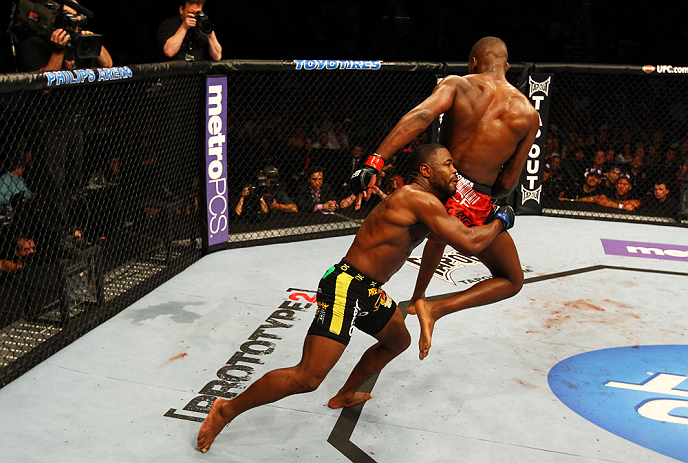 ATLANTA, GA - APRIL 21:  Rashad Evans (L) grabs Jon Jones during their light heavyweight title bout for UFC 145 at Philips Arena on April 21, 2012 in Atlanta, Georgia.  (Photo by Al Bello/Zuffa LLC/Zuffa LLC via Getty Images)