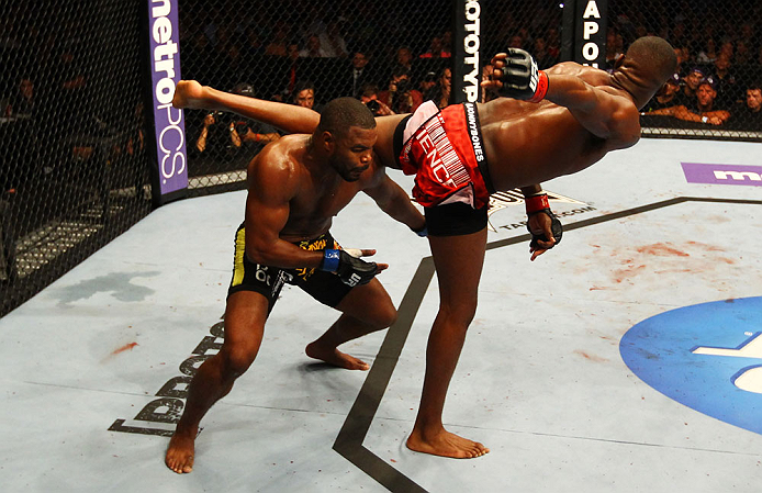 ATLANTA, GA - APRIL 21:  Jon Jones (R) kicks Rashad Evans during their light heavyweight title bout for UFC 145 at Philips Arena on April 21, 2012 in Atlanta, Georgia.  (Photo by Al Bello/Zuffa LLC/Zuffa LLC via Getty Images)