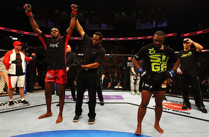 ATLANTA, GA - APRIL 21: Jon Jones (L) celebrates defeating Rashad Evans (R) by unanimous decision in their light heavyweight title bout for UFC 145 at Philips Arena on April 21, 2012 in Atlanta, Georgia. (Photo by Al Bello/Zuffa LLC/Zuffa LLC via Getty