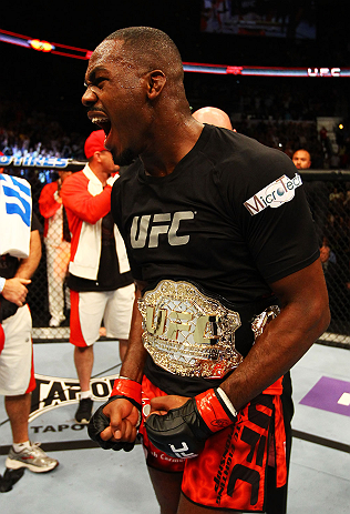 ATLANTA, GA - APRIL 21: Jon Jones celebrates defeating Rashad Evans by unanimous decision in their light heavyweight title bout for UFC 145 at Philips Arena on April 21, 2012 in Atlanta, Georgia. (Photo by Al Bello/Zuffa LLC/Zuffa LLC via Getty Images)