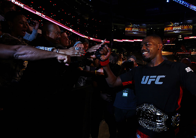 ATLANTA, GA - APRIL 21:  Jon Jones celebrates with fans after defeating Rashad Evans by unanimous decision in their light heavyweight title bout for UFC 145 at Philips Arena on April 21, 2012 in Atlanta, Georgia.  (Photo by Al Bello/Zuffa LLC/Zuffa LLC vi