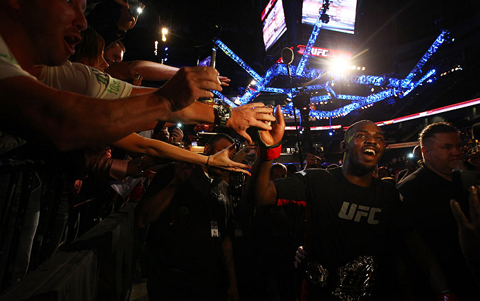 ATLANTA, GA - APRIL 21: Jon Jones celebrates with fans after defeating Rashad Evans by unanimous decision in their light heavyweight title bout for UFC 145 at Philips Arena on April 21, 2012 in Atlanta, Georgia. (Photo by Al Bello/Zuffa LLC/Zuffa LLC vi