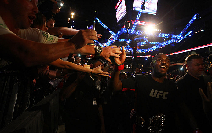 ATLANTA, GA - APRIL 21:  Jon Jones celebrates with fans after defeating Rashad Evans by unanimous decision in their light heavyweight title bout for UFC 145 at Philips Arena on April 21, 2012 in Atlanta, Georgia.  (Photo by Al Bello/Zuffa LLC/Zuffa LLC vi