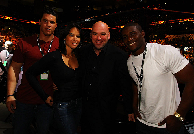 ATLANTA, GA - APRIL 21:  Actress Olivia Munn (2ndL), UFC President Dana White(2ndR), and NFL running back Reggie Bush (R) attend UFC 145: Jones v Evans at Philips Arena on April 21, 2012 in Atlanta, Georgia.  (Photo by Al Bello/Zuffa LLC/Zuffa LLC via Get