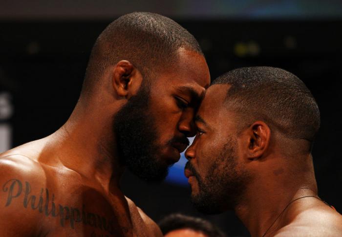 ATLANTA, GA - APRIL 20: Lightheavyweight fighters Jon Jones (L) and Rashad Evans face off during the UFC 145 official weigh in at Fox Theatre on April 20, 2012 in Atlanta, Georgia. (Photo by Al Bello/Zuffa LLC/Zuffa LLC via Getty Images)