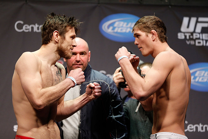 MONTREAL, QC - MARCH 15: (L-R) Dan Miller and Jordan Mein face off during the UFC 158 weigh-in at Bell Centre on March 15, 2013 in Montreal, Quebec, Canada. (Photo by Josh Hedges/Zuffa LLC/Zuffa LLC via Getty Images)