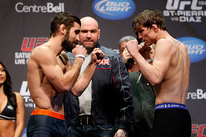 MONTREAL, QC - MARCH 15:  (L-R) Antonio Carvalho faces off with Darren Elkins during the UFC 158 weigh-in at Bell Centre on March 15, 2013 in Montreal, Quebec, Canada.  (Photo by Josh Hedges/Zuffa LLC/Zuffa LLC via Getty Images)