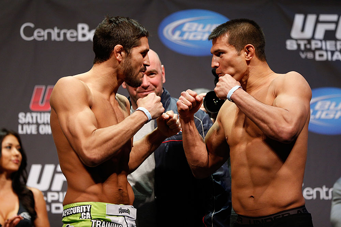 MONTREAL, QC - MARCH 15: (L-R) Patrick Cote faces off with Bobby Voelker during the UFC 158 weigh-in at Bell Centre on March 15, 2013 in Montreal, Quebec, Canada. (Photo by Josh Hedges/Zuffa LLC/Zuffa LLC via Getty Images)