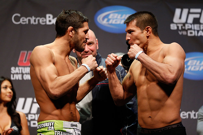 MONTREAL, QC - MARCH 15: (L-R) Patrick Cote faces off with Bobby Voelker during the UFC 158 weigh-in at Bell Centre on March 15, 2013 in Montreal, Quebec, Canada.  (Photo by Josh Hedges/Zuffa LLC/Zuffa LLC via Getty Images)