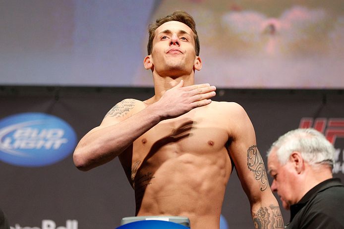 MONTREAL, QC - MARCH 15: Mike Ricci gestures to his home town during the UFC 158 weigh-in at Bell Centre on March 15, 2013 in Montreal, Quebec, Canada. (Photo by Josh Hedges/Zuffa LLC/Zuffa LLC via Getty Images)