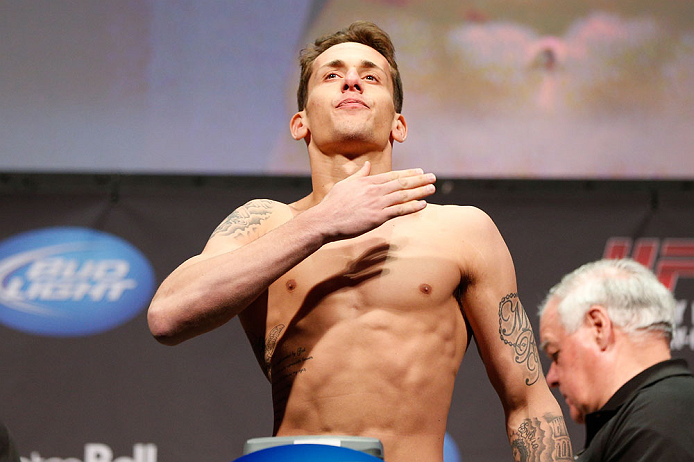 MONTREAL, QC - MARCH 15: Mike Ricci gestures to his home town during the UFC 158 weigh-in at Bell Centre on March 15, 2013 in Montreal, Quebec, Canada.  (Photo by Josh Hedges/Zuffa LLC/Zuffa LLC via Getty Images)