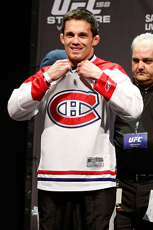 MONTREAL, QC - MARCH 15: Jake Ellenberger sporting the home teams hockey jersey during the UFC 158 weigh-in at Bell Centre on March 15, 2013 in Montreal, Quebec, Canada. (Photo by Josh Hedges/Zuffa LLC/Zuffa LLC via Getty Images)