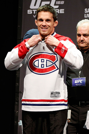 MONTREAL, QC - MARCH 15: Jake Ellenberger sporting the home teams hockey jersey during the UFC 158 weigh-in at Bell Centre on March 15, 2013 in Montreal, Quebec, Canada.  (Photo by Josh Hedges/Zuffa LLC/Zuffa LLC via Getty Images)