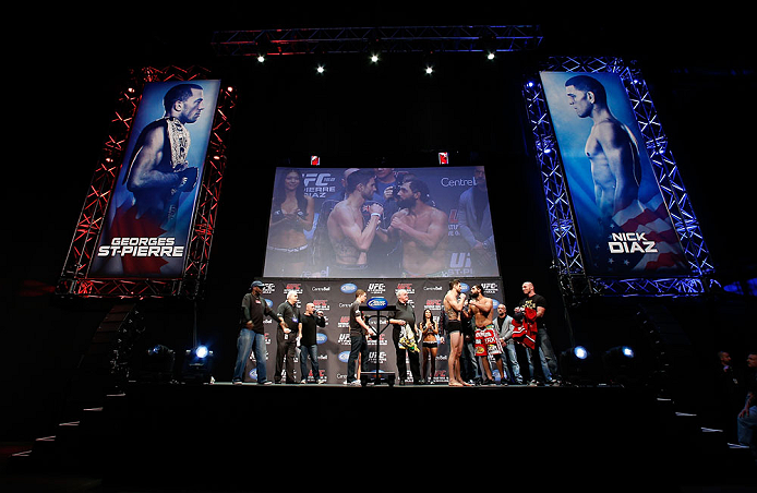 MONTREAL, QC - MARCH 15: (L-R) Opponents Carlos Condit and Johny Hendricks face off during the UFC 158 weigh-in at Bell Centre on March 15, 2013 in Montreal, Quebec, Canada. (Photo by Josh Hedges/Zuffa LLC/Zuffa LLC via Getty Images)