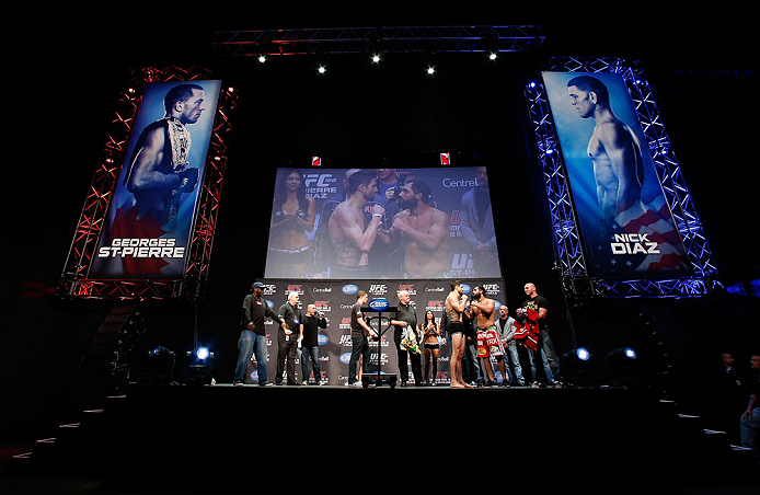 MONTREAL, QC - MARCH 15:  (L-R) Opponents Carlos Condit and Johny Hendricks face off during the UFC 158 weigh-in at Bell Centre on March 15, 2013 in Montreal, Quebec, Canada.  (Photo by Josh Hedges/Zuffa LLC/Zuffa LLC via Getty Images)