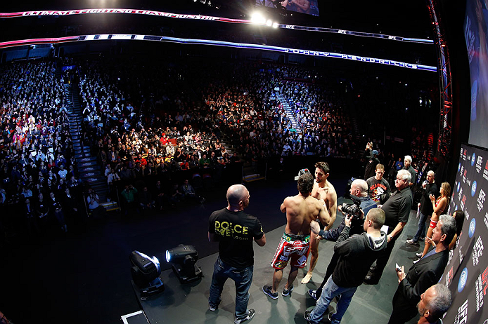 MONTREAL, QC - MARCH 15:  (R-L) Opponents Carlos Condit and Johny Hendricks face off during the UFC 158 weigh-in at Bell Centre on March 15, 2013 in Montreal, Quebec, Canada.  (Photo by Josh Hedges/Zuffa LLC/Zuffa LLC via Getty Images)