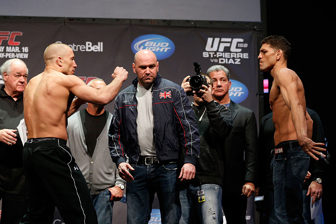 MONTREAL, QC - MARCH 15: Georges St-Pierre (L) and Nick Diaz (R) face off during the UFC 158 weigh-in at Bell Centre on March 15, 2013 in Montreal, Quebec, Canada. (Photo by Josh Hedges/Zuffa LLC/Zuffa LLC via Getty Images)