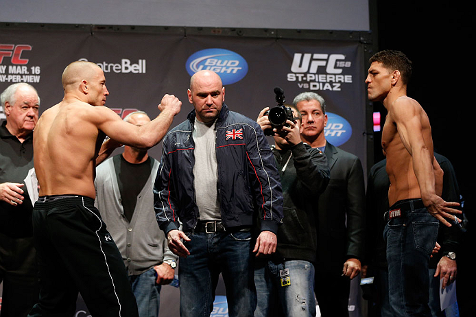 MONTREAL, QC - MARCH 15: Georges St-Pierre (L) and Nick Diaz (R) face off during the UFC 158 weigh-in at Bell Centre on March 15, 2013 in Montreal, Quebec, Canada.  (Photo by Josh Hedges/Zuffa LLC/Zuffa LLC via Getty Images)