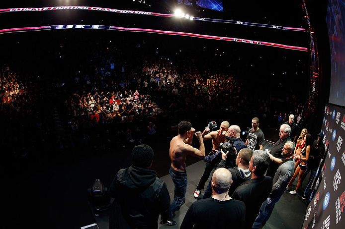 MONTREAL, QC - MARCH 15:  (R-L) Opponents Georges St-Pierre and Nick Diaz face off during the UFC 158 weigh-in at Bell Centre on March 15, 2013 in Montreal, Quebec, Canada.  (Photo by Josh Hedges/Zuffa LLC/Zuffa LLC via Getty Images)