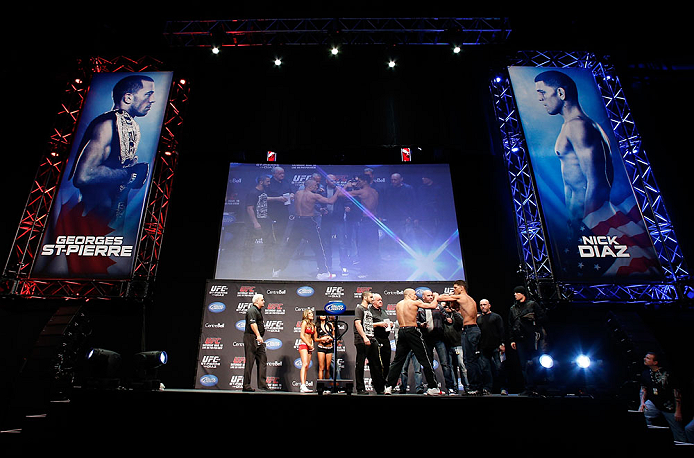 MONTREAL, QC - MARCH 15: (L-R) Opponents Georges St-Pierre and Nick Diaz face off during the UFC 158 weigh-in at Bell Centre on March 15, 2013 in Montreal, Quebec, Canada. (Photo by Josh Hedges/Zuffa LLC/Zuffa LLC via Getty Images)