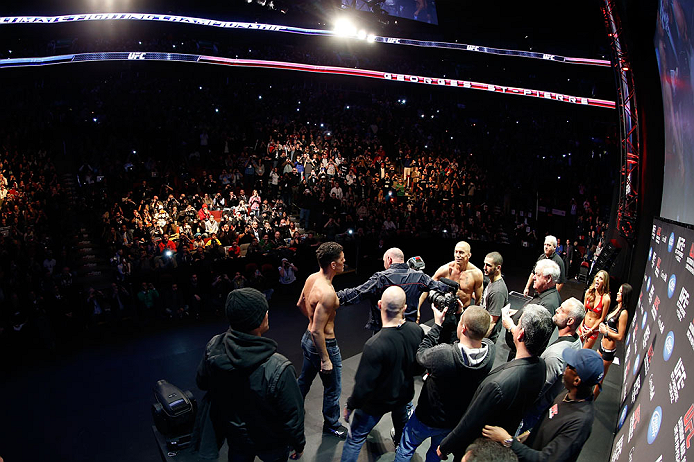 MONTREAL, QC - MARCH 15:  (R-L) Opponents Georges St-Pierre and Nick Diaz are separated by UFC president Dana White during the UFC 158 weigh-in at Bell Centre on March 15, 2013 in Montreal, Quebec, Canada.  (Photo by Josh Hedges/Zuffa LLC/Zuffa LLC via Ge