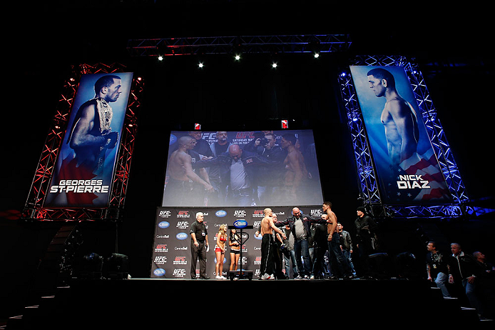 MONTREAL, QC - MARCH 15: (L-R) Opponents Georges St-Pierre and Nick Diaz are separated by UFC president Dana White during the UFC 158 weigh-in at Bell Centre on March 15, 2013 in Montreal, Quebec, Canada. (Photo by Josh Hedges/Zuffa LLC/Zuffa LLC via Ge