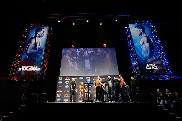 MONTREAL, QC - MARCH 15:  (L-R) Opponents Georges St-Pierre and Nick Diaz are separated by UFC president Dana White during the UFC 158 weigh-in at Bell Centre on March 15, 2013 in Montreal, Quebec, Canada.  (Photo by Josh Hedges/Zuffa LLC/Zuffa LLC via Ge