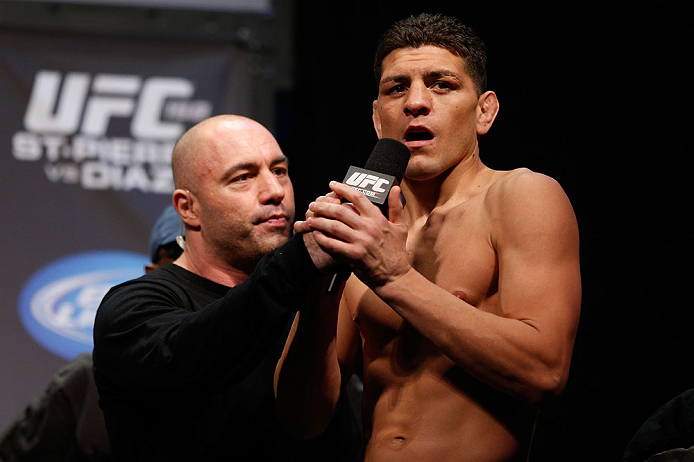 MONTREAL, QC - MARCH 15: Nick Diaz speaks with Joe Rogan during the UFC 158 weigh-in at Bell Centre on March 15, 2013 in Montreal, Quebec, Canada. (Photo by Josh Hedges/Zuffa LLC/Zuffa LLC via Getty Images)