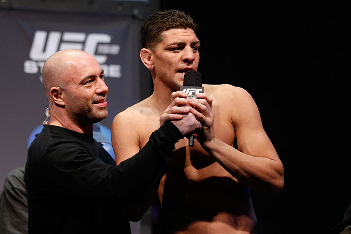 MONTREAL, QC - MARCH 15:  Nick Diaz speaks with Joe Rogan during the UFC 158 weigh-in at Bell Centre on March 15, 2013 in Montreal, Quebec, Canada.  (Photo by Josh Hedges/Zuffa LLC/Zuffa LLC via Getty Images)