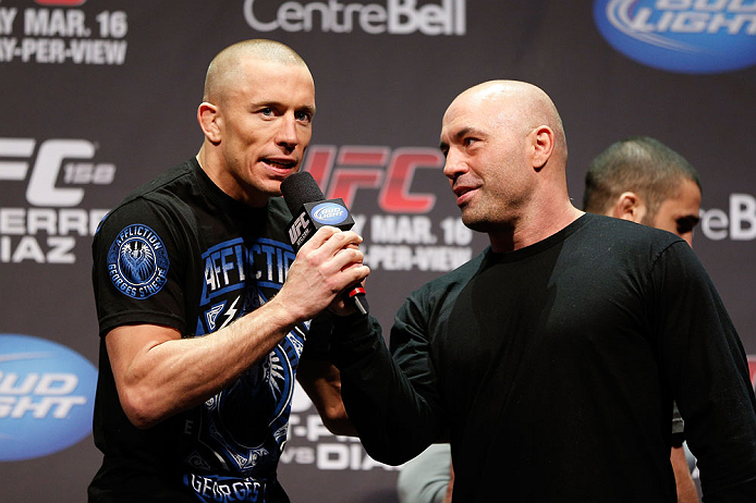 MONTREAL, QC - MARCH 15: Georges St-Pierre speaks with Joe Rogan during the UFC 158 weigh-in at Bell Centre on March 15, 2013 in Montreal, Quebec, Canada. (Photo by Josh Hedges/Zuffa LLC/Zuffa LLC via Getty Images)