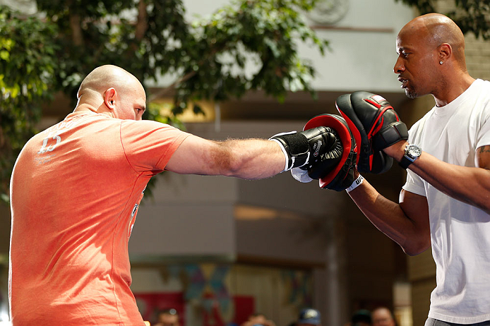 WINNIPEG, CANADA - JUNE 12: (L-R) Shawn Jordan works out with former CFL football player Lamar McGriggs during an open workout session for fans and media at Portage Place on June 12, 2013 in Winnipeg, Manitoba, Canada. (Photo by Josh Hedges/Zuffa LLC/Zu