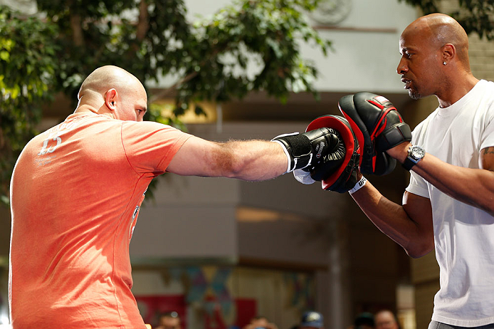 WINNIPEG, CANADA - JUNE 12:  (L-R) Shawn Jordan works out with former CFL football player Lamar McGriggs during an open workout session for fans and media at Portage Place on June 12, 2013 in Winnipeg, Manitoba, Canada.  (Photo by Josh Hedges/Zuffa LLC/Zu