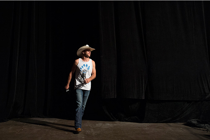 DALLAS, TX - MARCH 13: Donald "Cowboy" Cerrone walks on stage during the UFC 185 weigh-ins at the Kay Bailey Hutchison Convention Center on March 13, 2015 in Dallas, Texas. (Photo by Cooper Neill/Zuffa LLC/Zuffa LLC via Getty Images)