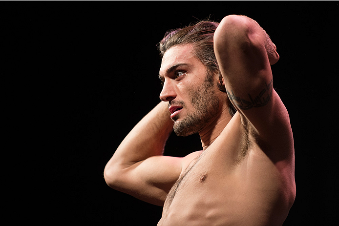 DALLAS, TX - MARCH 13: Elias Theodorou stands on the scale during the UFC 185 weigh-ins at the Kay Bailey Hutchison Convention Center on March 13, 2015 in Dallas, Texas. (Photo by Cooper Neill/Zuffa LLC/Zuffa LLC via Getty Images)