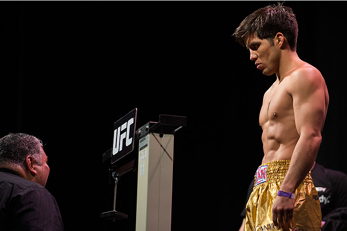 DALLAS, TX - MARCH 13: Henry Cejudo stands on the scale during the UFC 185 weigh-ins at the Kay Bailey Hutchison Convention Center on March 13, 2015 in Dallas, Texas. (Photo by Cooper Neill/Zuffa LLC/Zuffa LLC via Getty Images)