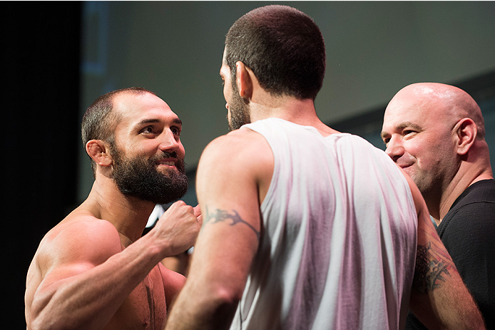 DALLAS, TX - MARCH 13: Johny Hendricks faces off with Matt Brown during the UFC 185 weigh-ins at the Kay Bailey Hutchison Convention Center on March 13, 2015 in Dallas, Texas. (Photo by Cooper Neill/Zuffa LLC/Zuffa LLC via Getty Images)