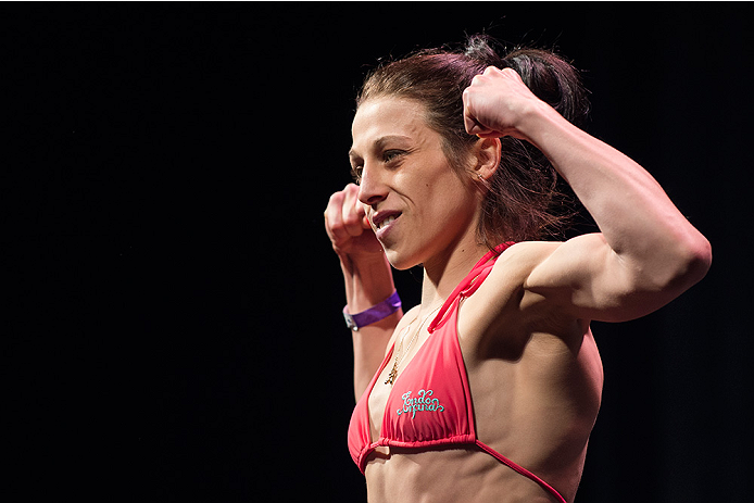 DALLAS, TX - MARCH 13: Joanna Jedrzejczyk stands on the scale during the UFC 185 weigh-ins at the Kay Bailey Hutchison Convention Center on March 13, 2015 in Dallas, Texas. (Photo by Cooper Neill/Zuffa LLC/Zuffa LLC via Getty Images)